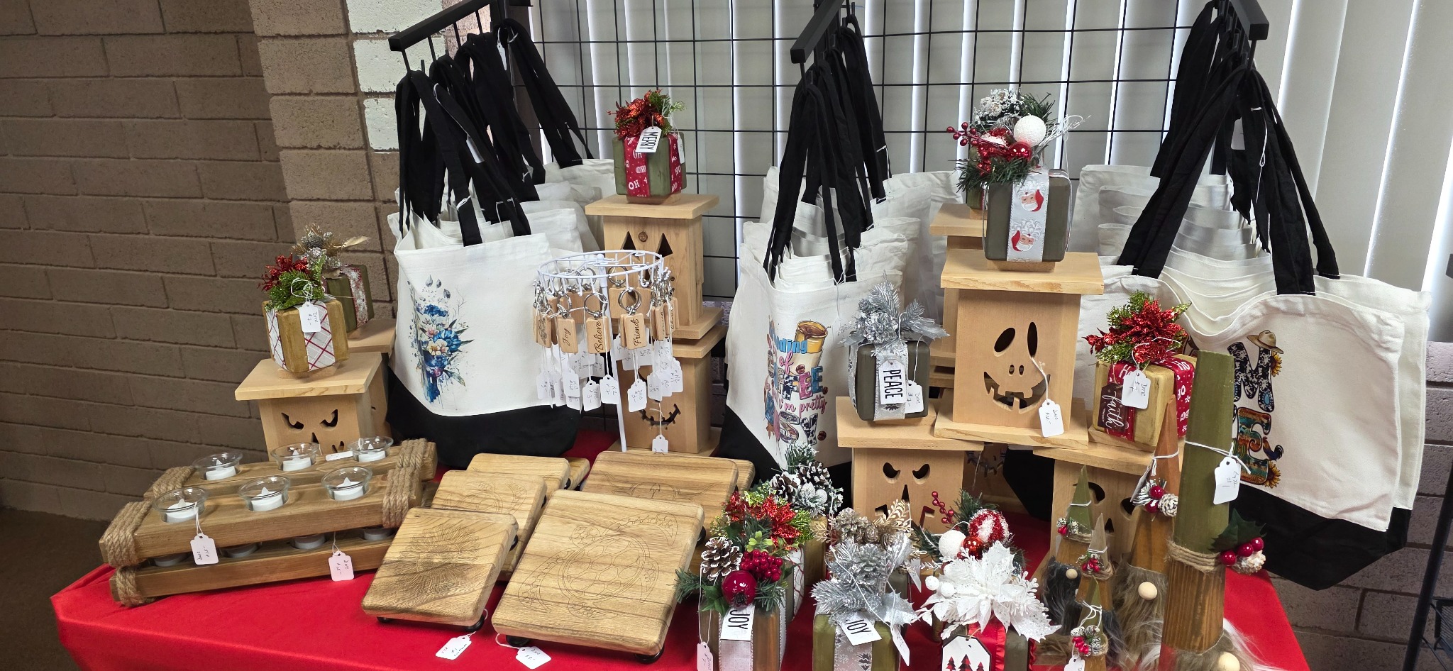 Arman's wood pieces, tote bags and seasonal decorations