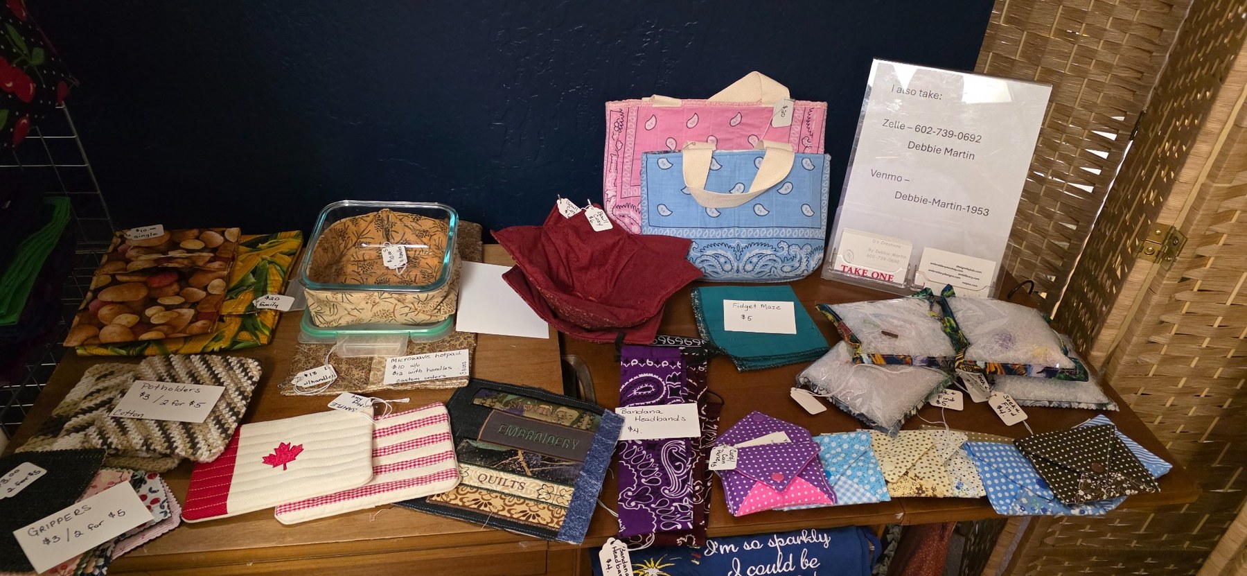 Debbie Martin's colorful folded fabric pieces, potholders, bags and handmade kitchen accessories