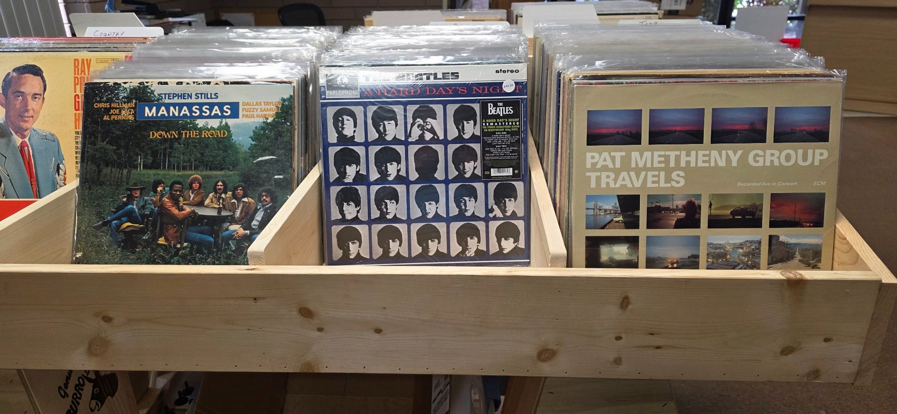 Vinyl record bins at Cottonwood Makers Mart with Manassas, the Beatles and Pat Metheny Group albums